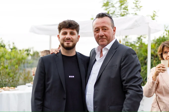 El Cav. Giuseppe Dangelo, fundador de Valdan Security Group, con su hijo en un evento de empresa